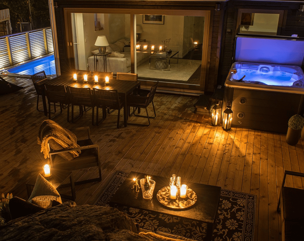 Hot tub surrounded by candles