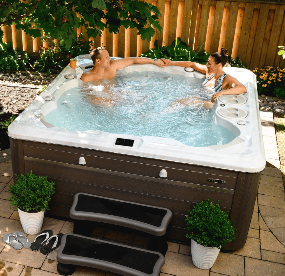 Couple chilling at luxurious hot tub
